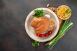© Надія Коваль - Roasted pork knuckle with vegetables on dark background