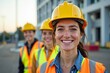 © Vera - Empowered Female Construction Worker Smiling with Confidence, Highlighting Teamwork and Empowerment in a Male-Dominated Field.