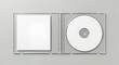 © kola - blank dvd case, Open clear plastic CD jewel case with blank white disc and insert for branding. Mock-up of compact disc packaging on soft gray background. Represents digital storage, music or software