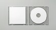 © kola - blank dvd case, Open clear plastic CD jewel case with blank white disc and insert for branding. Mock-up of compact disc packaging on soft gray background. Represents digital storage, music or software