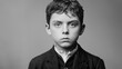 © Sonita - A black-and-white portrait of a Victorian orphan boy with a somber expression.