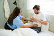 Nurse assisting patient with bandage at home after surgery