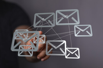 Interconnected email icons represent global communication and networking.