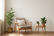 © DailyStock - Grey armchair with side table and plants in a minimalist room setting furniture interior