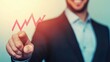 © Anousone - Businessman confidently pointing at a positive financial trend on a graph, success, achievement