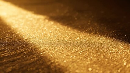 Wall Mural - A warm golden spotlight slowly scans across a shimmering, textured surface, creating an opulent seamlessly looping video background digital, vibrant, illumination