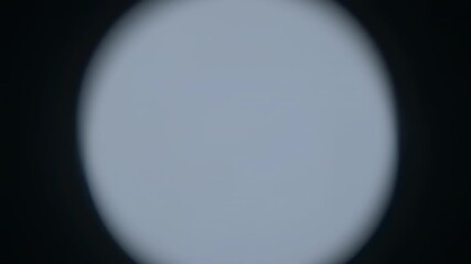 Wall Mural - A seamlessly looping video presents a soft white circular flare dissolving into a subtle mist, creating a serene abstract atmospheric effect backdrop, serene abstract atmospheric effect, shine