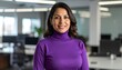 © Cindy - Confident businesswoman in purple turtleneck, modern office background