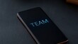 © FocusFusion - Team Displayed on Smartphone Screen in Dark Setting