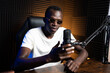 © Tubab Photograph/Stocksy - Content creator recording audio podcast using microphone