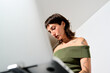 © Guille Faingold/Stocksy - Focused business woman working.