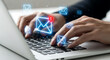© HADI INCREDIBLE - Close up of hands typing on laptop keyboard surrounded by glowing email icons with one notification received.