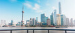 Cityscape view of Shanghai city in the morning. Skyscraper of Lujiazui in Pudong, view from The Bund of Shanghai, China. landmark and popular for tourism attractions. Travel and Vacation concept