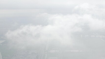 Wall Mural - Aerial view above the clouds and sky inspiration concept in cinematic breathtaking aerial flying over white fluffy cloudscape in high altitude sky with fresh clean air and blue skies on background.