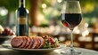 © ProPhotos - Glass of red wine with artisan slices of ham beside it, on the table, offering a perfect balance of flavors, enhancing the dining experience with its rich tones and savory ingredients.
