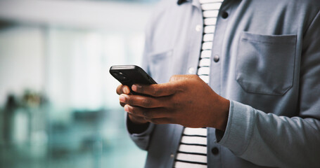 Typing, hands and man in office with mobile, online communication or content plan for client. Productivity, digital or marketing consultant in agency with tech, stakeholder chat or update on email.