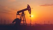 © sorin - Silhouette of an oil pump against a sunset  representing the us petroleum industry