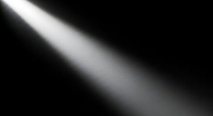Canvas Print - Bright White Spotlight Beam Illuminating Textured Dark Surface illumination