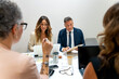© Alfonso Soler - Business people working together at office desk during corporate meeting