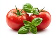 © Pan - Two ripe tomatoes, glistening with water droplets, and fresh basil leaves