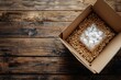 © saiakt - Cardboard package containing white protective peanuts filler high resolution picture