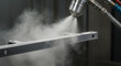 © Ainul - Powder coating process applies protective finish to metal part for industrial manufacturing