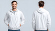 © Deliend - Smiling man wearing a stylish white hooded jacket for urban lifestyle and active wear campaigns