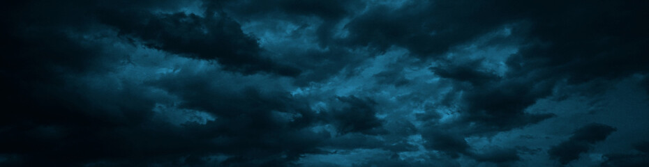 Wall Mural - dramatic sky with heavy clouds. black dark blue green grey night cloudy sky. thunderstorm storm rain
