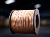 Copper wire cable spool closeup shiny metallic coil electrical industry material
