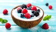 © Man - Blue coconut bowl with berries