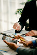 © Daenin - The financiers are calculating personal taxes for their customers
