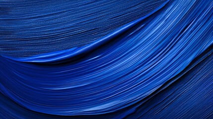 Wall Mural - blue brush stroke with a blue background. the brush stroke is long and curvy