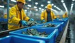 © Vadym - Workers in yellow vests, hard hats sort electronic components on conveyor belt in recycling plant. Blue bins hold circuit boards, computer parts for material recovery. Shows process for handling