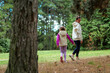© DusanJelicic - Mother and daughter walking in forest, enjoying nature together