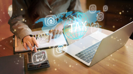 Wall Mural - Tax Preparation Asian Adult Business Woman Calculates Finance Report Using Calculator on Laptop Computer at Home Office Analyzes Income Data for Financial Planning