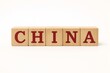 © Hapun - Wooden blocks spelling CHINA word on white background