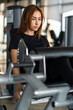 © Jirakul - Focused individual engages in gym workout using fitness equipment designed for exercise. This scene captures dedication to fitness and importance of maintaining healthy lifestyle