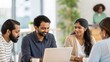 © N7 - Young Indian professionals brainstorming in casual office space — fostering teamwork and innovation