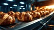 © senadlife - Freshly baked croissants emerge from a glowing bakery oven, their golden crust inviting you into a world of warm pastries and the comforting aroma of baked goods.