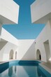 © duyina1990 - Modern white architecture with a swimming pool under clear blue sky