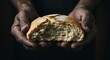 © Magic_Pixel_Studio - A person holding a piece of bread in their hands