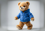 An endearing 3D teddy bear character, designed with a soft toy texture, wearing a blank blue hoodie and positioned against a clean white background.