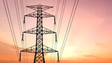 Energy Conduit: A towering electricity pylon stands silhouetted against a vibrant sunset sky, carrying power lines that deliver energy to homes and industries alike.