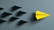 © Drop - Yellow paper airplane leads black fleet
