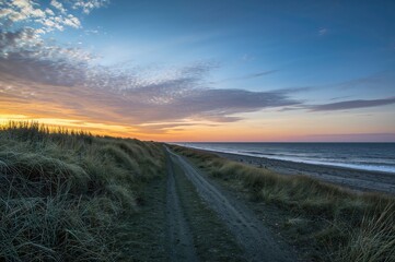 Wall Mural - a coastal area by the sea featuring stunning sunsets ideal for beach and dune walks.