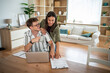 © Migma_Agency - Happy couple planning finances and managing budget at home