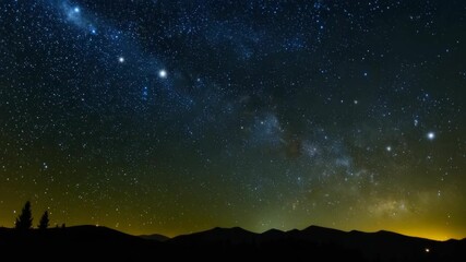 Wall Mural - Spectacular night sky featuring Milky Way over silhouette of trees and hills, clear dark night with vivid stars, astronomy and scenic view