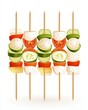 © Espresso - Colorful vegetable skewers with fresh ingredients ready for grilling.