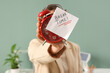 © Pixel-Shot - Businesswoman holding paper with text BREAK TIME and alarm clock in office, closeup