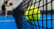 © krisnanto - Paddle Tennis Ball in Net Close-Up Shot of a Game in Progress